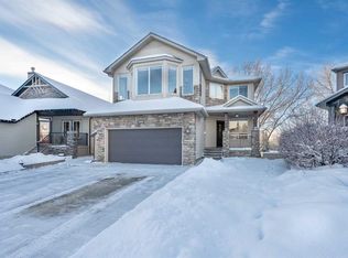 109 Crystal Green Ct, Okotoks, AB T1S 2K5