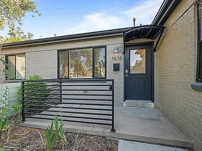 Welcome to your new home! This cozy brick exterior offers a blend of tradition and modern style.
