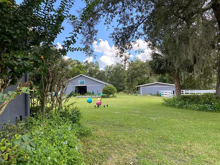 Front of house leading towards barns