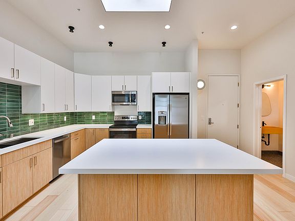 Kitchen and powder room to the right