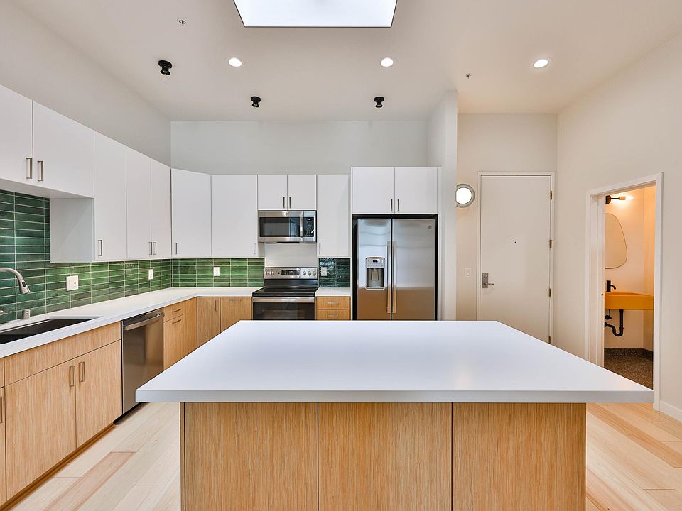 Kitchen and powder room to the right