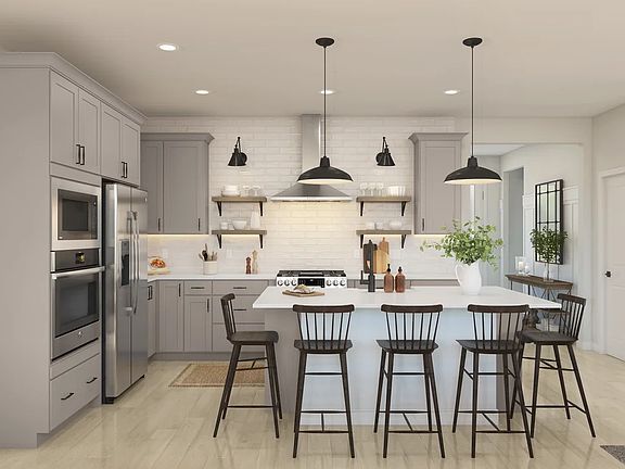 Kitchen with pendant lighting and center island