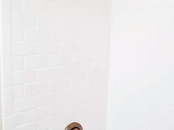 Subway tile shower/tub combo