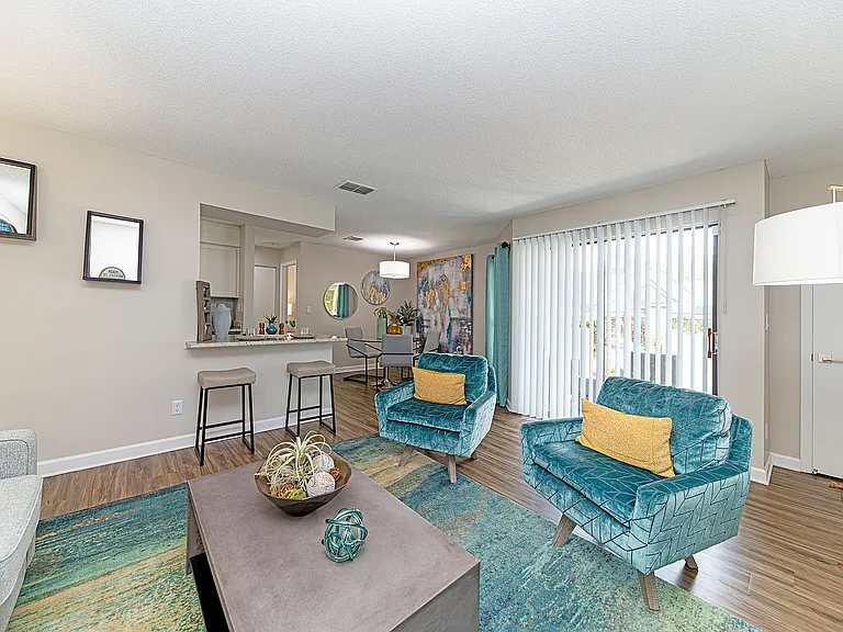 Spacious living room with hardwood-style flooring