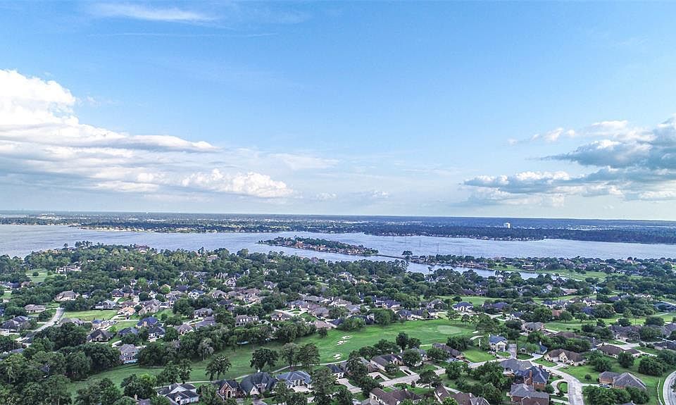 Image 1: FEEL LIKE YOU ARE ON VACATION EVERY DAY! This listing in prestigious Bentwater is WATERFRONT AND on the GOLF COURSE!