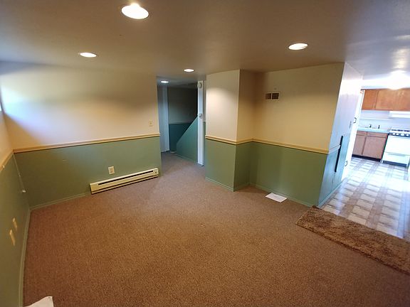 Bedroom & Living Area. Lots of storage space in unit not shown on photos