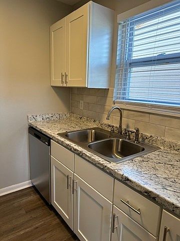 Brand new cabinets, tile, countertops and appliances.