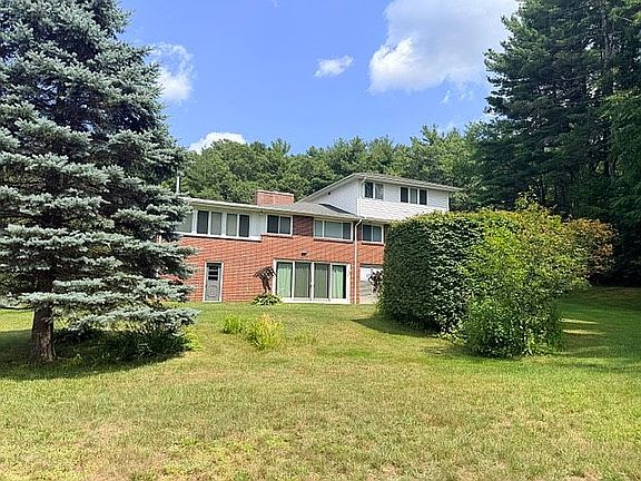 view of house from rock wall