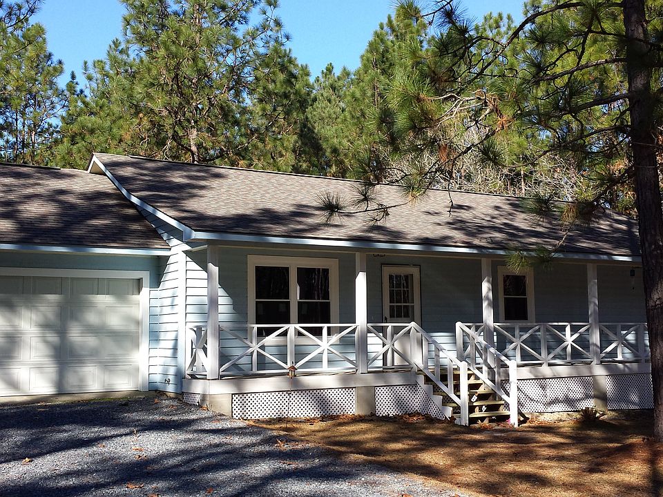 Front with single garage and porch