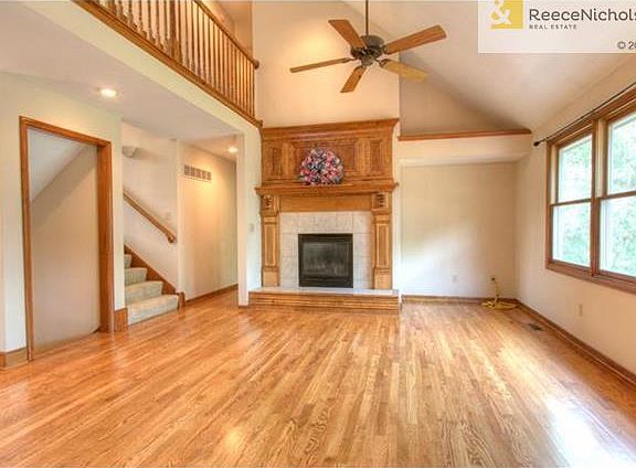 Dining room looking into the living room, look at that gorgeous fireplace