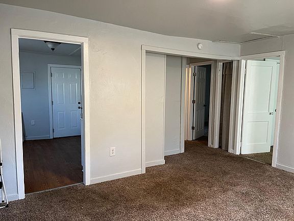 From front door entrance you are standing in the living room. To the left is the kitchen which leads to out back and a huge back yard. To the right are the two bedrooms and the bathroom.