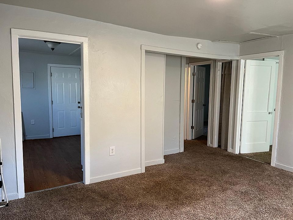 From front door entrance you are standing in the living room. To the left is the kitchen which leads to out back and a huge back yard. To the right are the two bedrooms and the bathroom.
