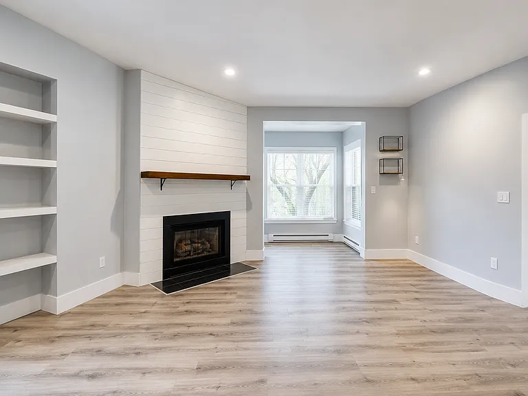 It even has a wood-burning fireplace to add the word "cozy" during the darkest days of winter.