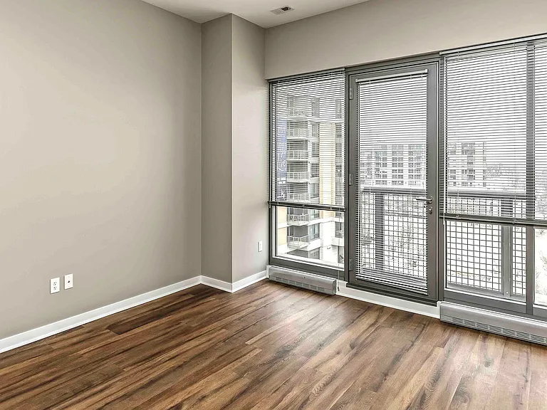 Large floor to ceiling windows let in abundant natural light.