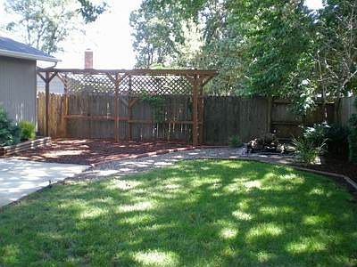 backyard with arbor
