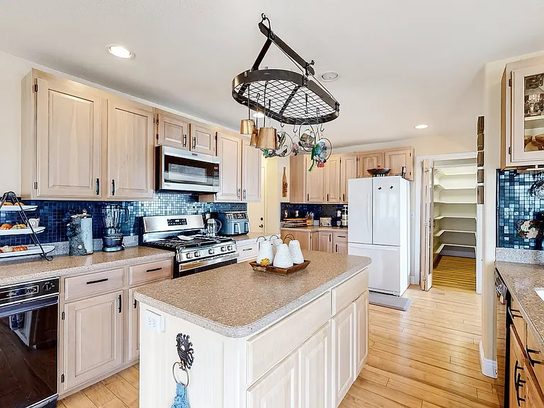 Gourmet kitchen with walk in pantry.