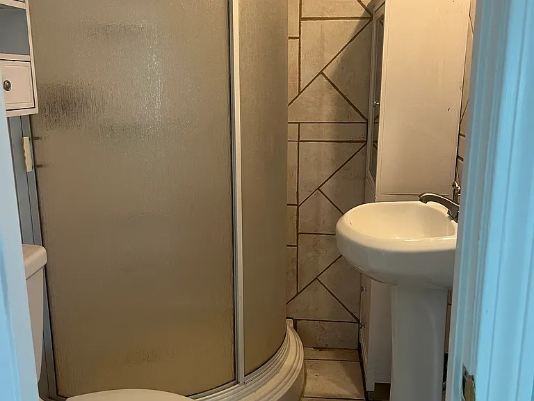 Bath with shower