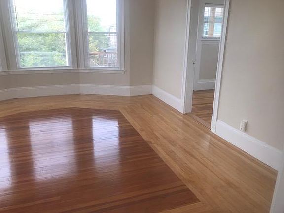 Living room, door leads to office and private porch
