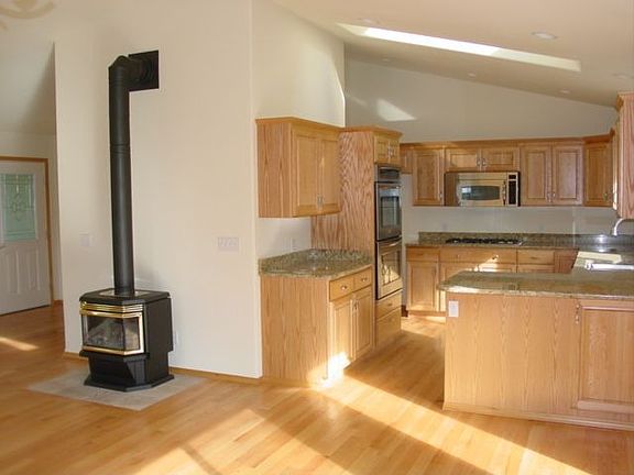 Family room w/one of two fireplaces