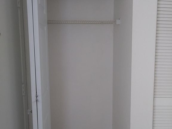 Closet by door entrance