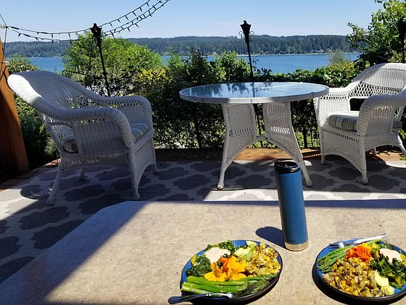 Meals on the covered deck with skylights and bay view!