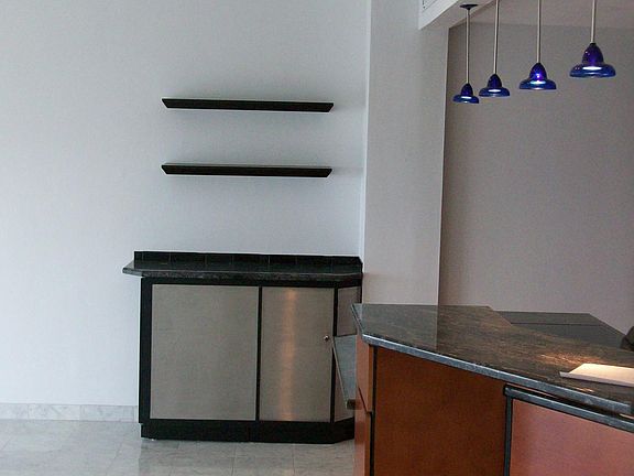 Extra storage w/wine cooler.