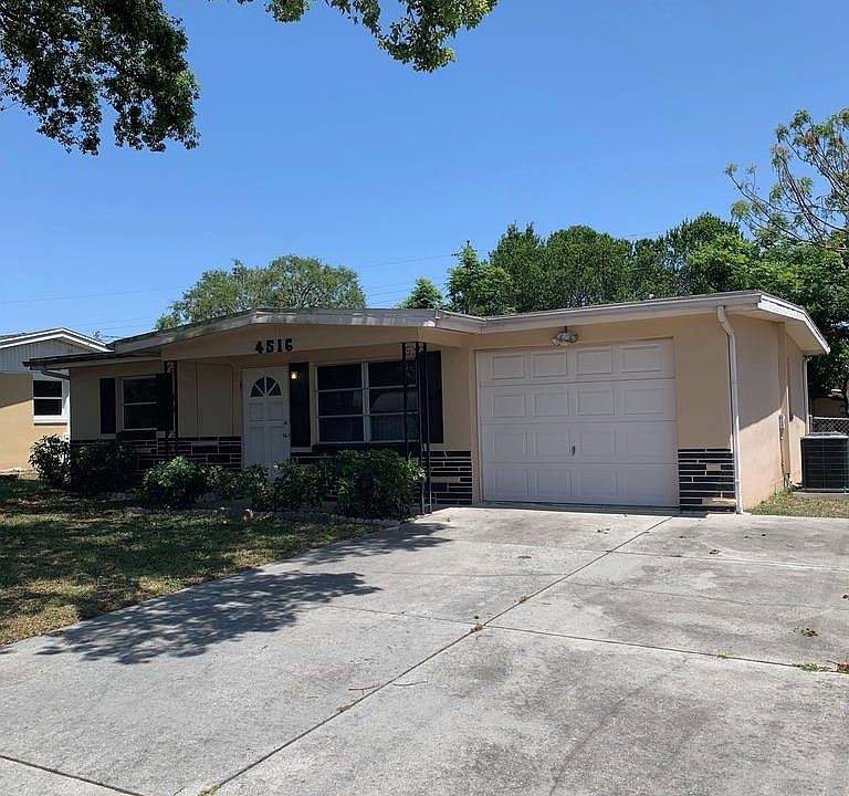 2 Bedroom, 1 bath, single car garage single-family home with lots of exterior parking