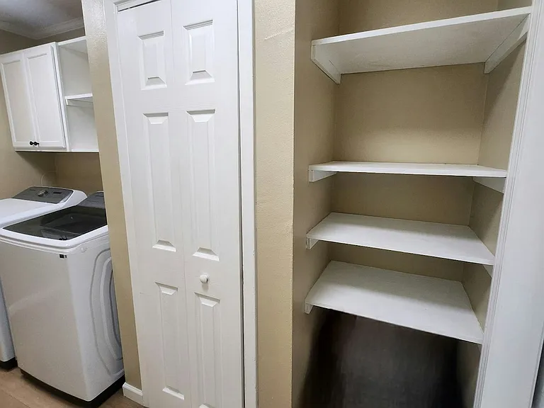 water heater closet and storage shelves