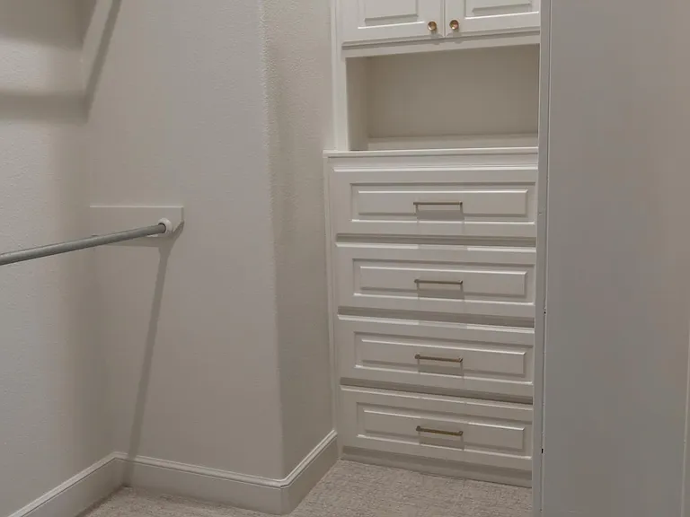 Walk-In Closet w/ Custom Built-In's