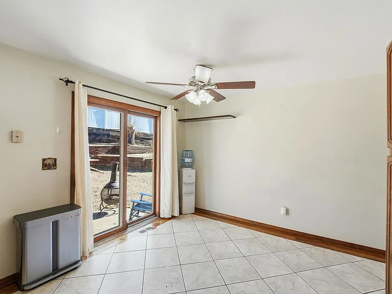 Kitchen, and backyard door.