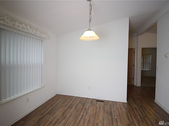 Dining room off of kitchen - hall to the 2 bedrooms, hall bathroom and laundry room is to the right.