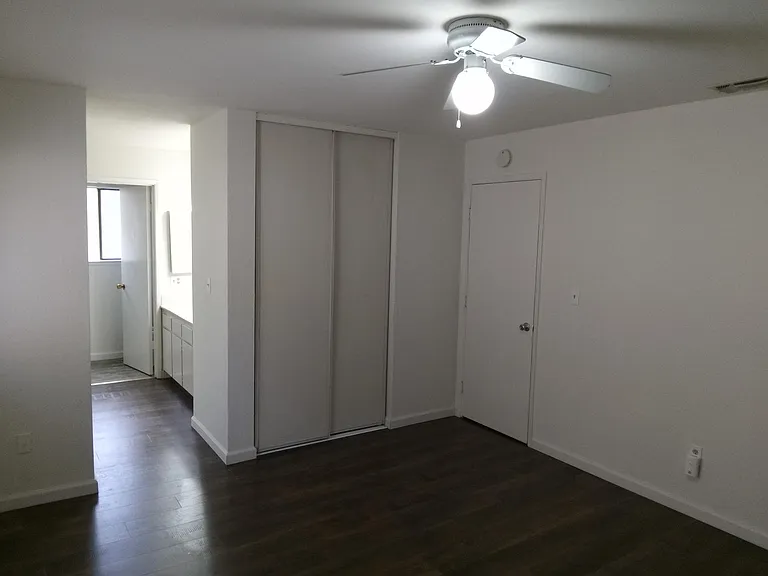 Spacious Master Bedroom with two closets with closet doors, dual sinks and en suite bathroom with beautiful Pergo Flooring.