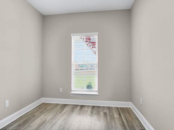 Secondary bedroom in the Jules floorplan at a Meritage Homes community in Gulfport, MS.