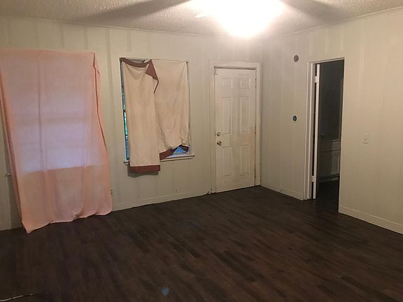 Back bedroom with 1/2 bathroom