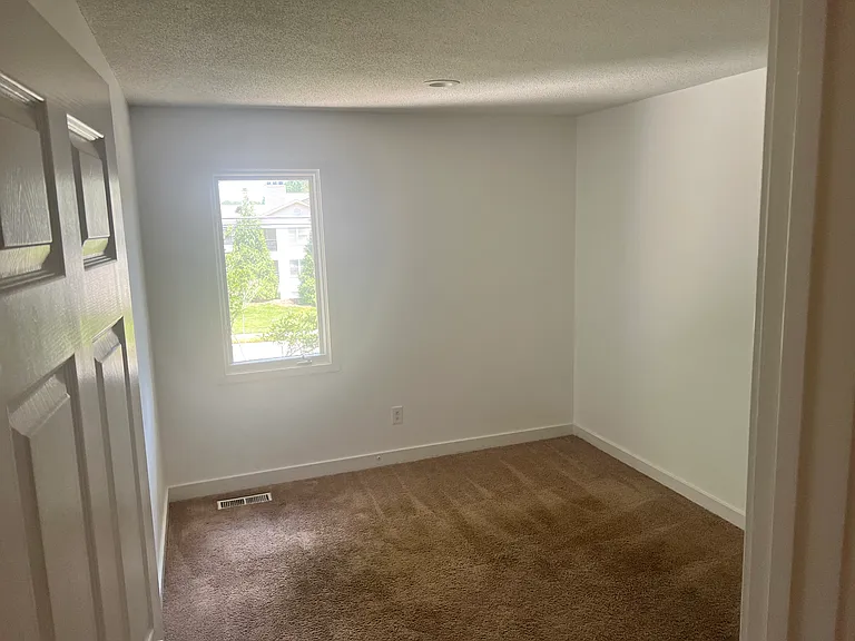 Smaller bedroom window.