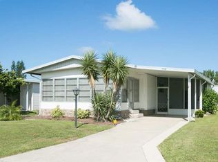 1034 Thrush Cir, Barefoot Bay, FL 32976