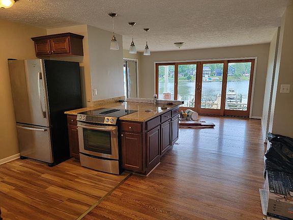 Kitchen looking into living room area