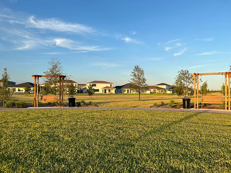VIEW OF GREENSPACE AND BACKYARD