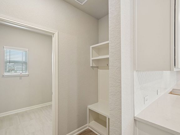 Foyer of the Beckley floorplan at a Meritage Homes community.