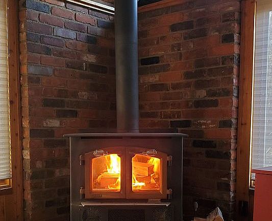 Wood stove in sun room.