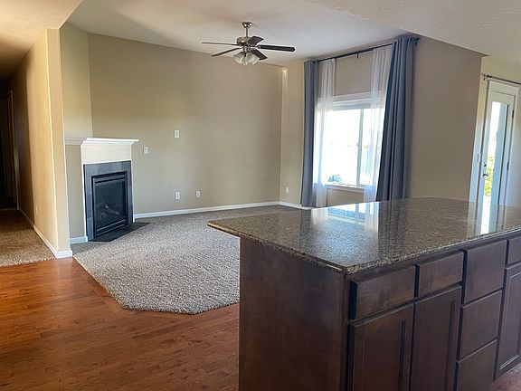 Kitchen to living room with gas stove