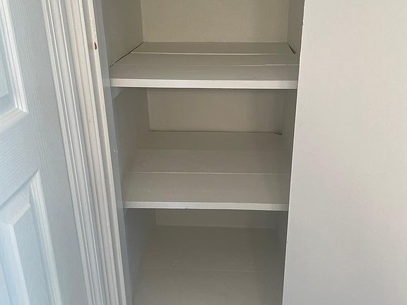 Rare linen closet in bathroom.