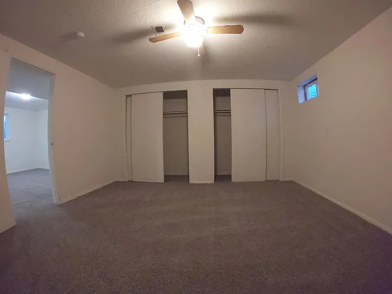 Downstairs bedroom (LOTS of closet space!). (new carpet and paint)
