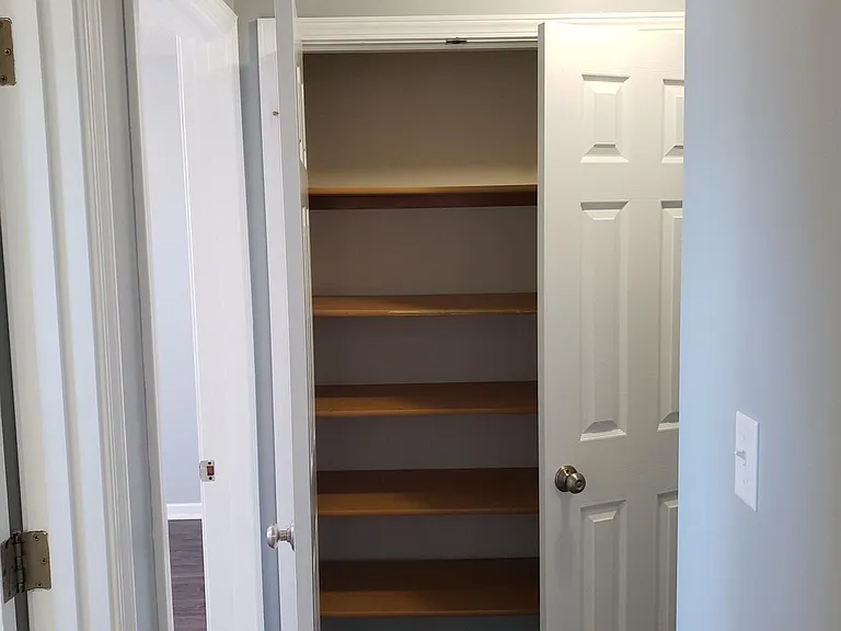 2nd floor linen closet in hallway - view from guest bedroom