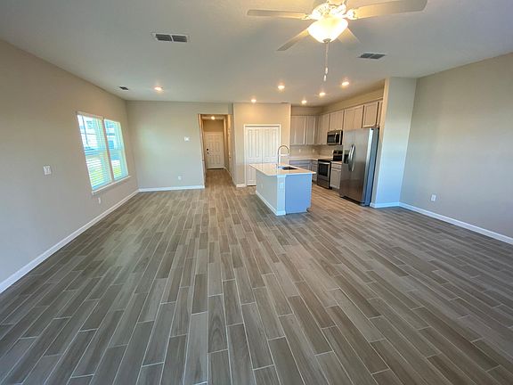 Modern tile floor throughout downstairs