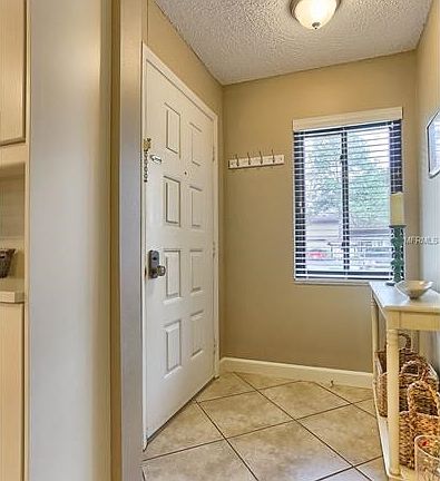 Ceramic tile and freshly painted the entryway