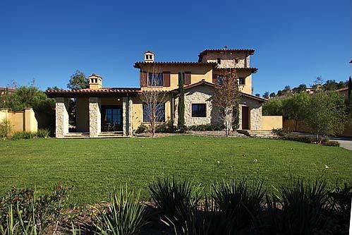 Enjoy privacy in a large grassy yard. Ideal for a pool/spa.