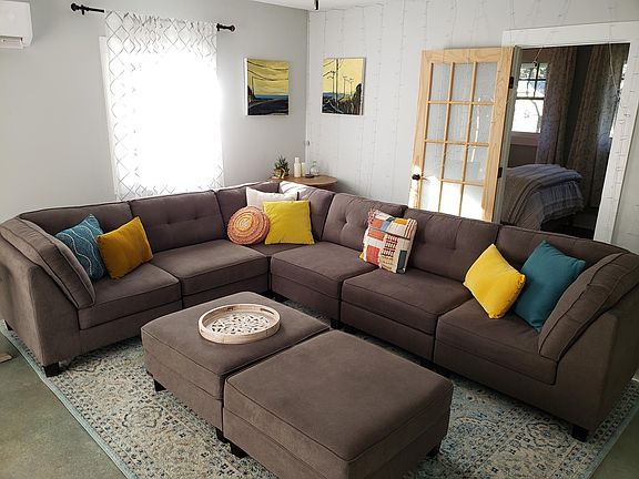 The large sectional sofa can be arranged in many different ways to accommodate your lounging desires.