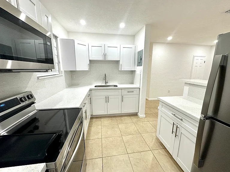 Spacious brand new kitchen with brand new appliances