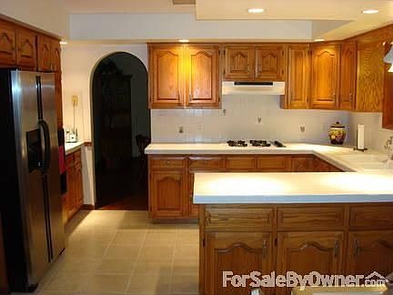 Kitchen
						:
						Newer appliances including stainless steel refrigerator